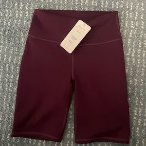 NWT Fabletics Plum PowerHold 9” Bikershorts S